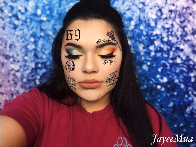 Does 6ix9ine have veneers?