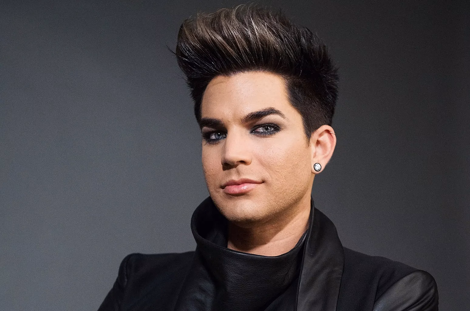 Why does Adam Lambert wear so much makeup?