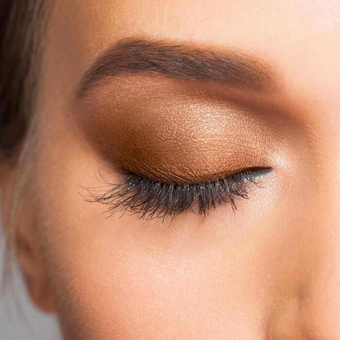 What color makeup makes brown eyes pop?