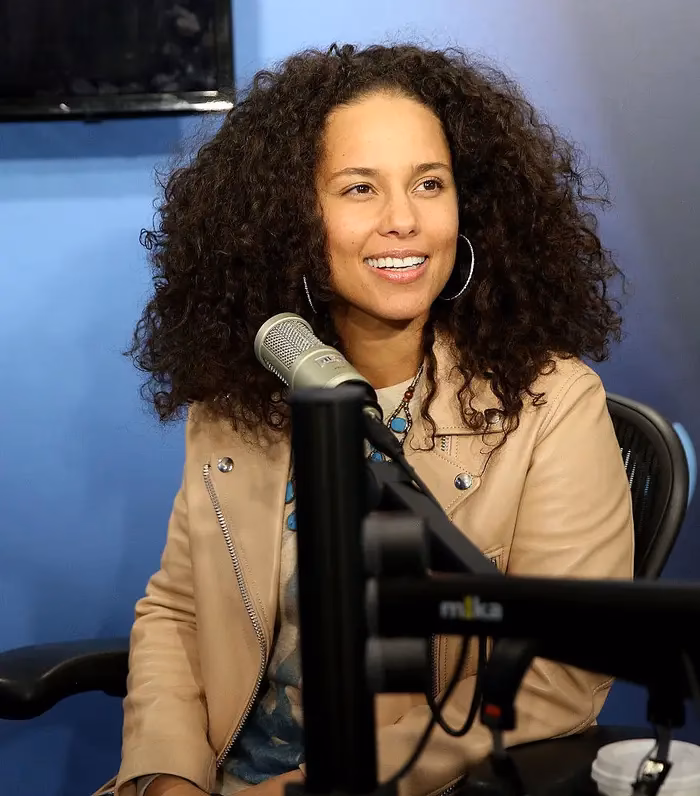 What did Alicia Keys struggle with?
