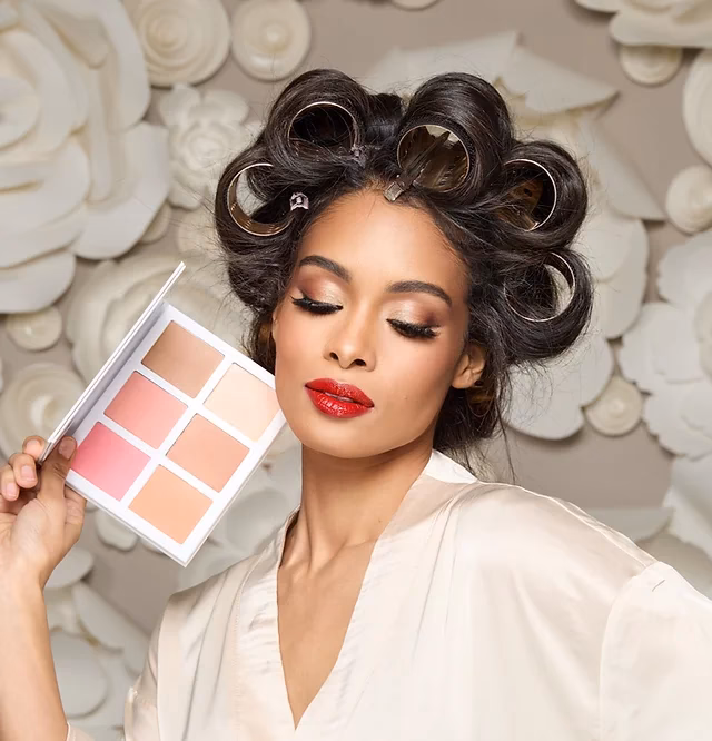 Who is the owner of Bam Beauty Bar?