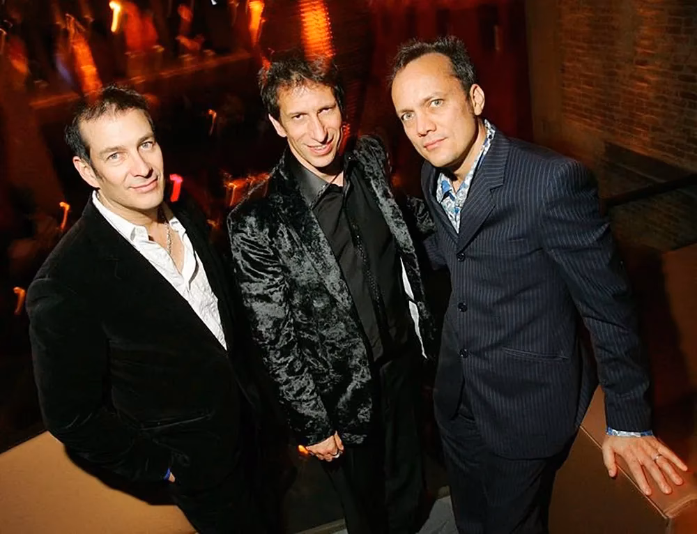 Why do the Blue Man Group paint themselves?