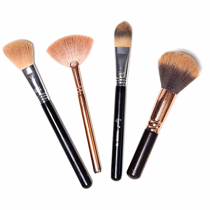 Is it better to contour with a brush or sponge?