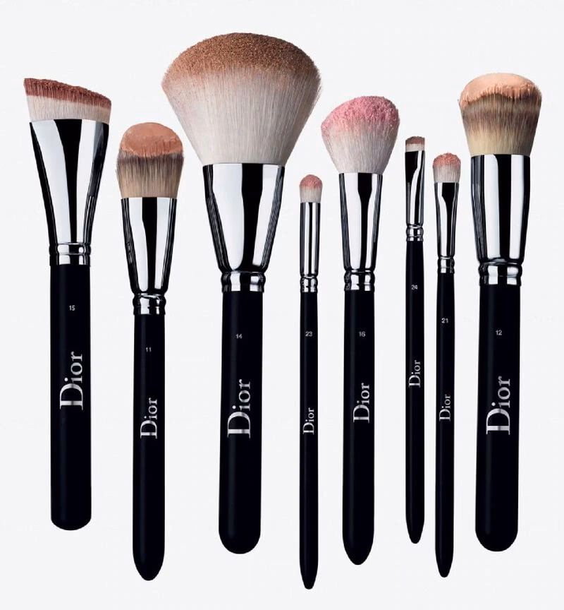 How do you clean a Dior brush?