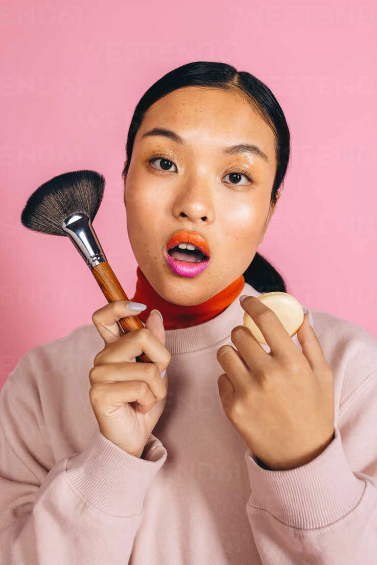 Why do you open your mouth when applying mascara?