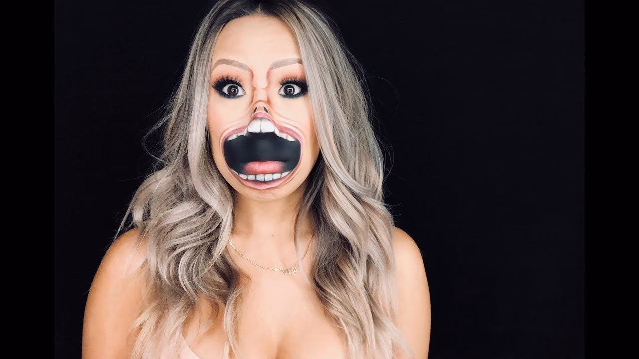 Why do I open my mouth when touching my eyes?