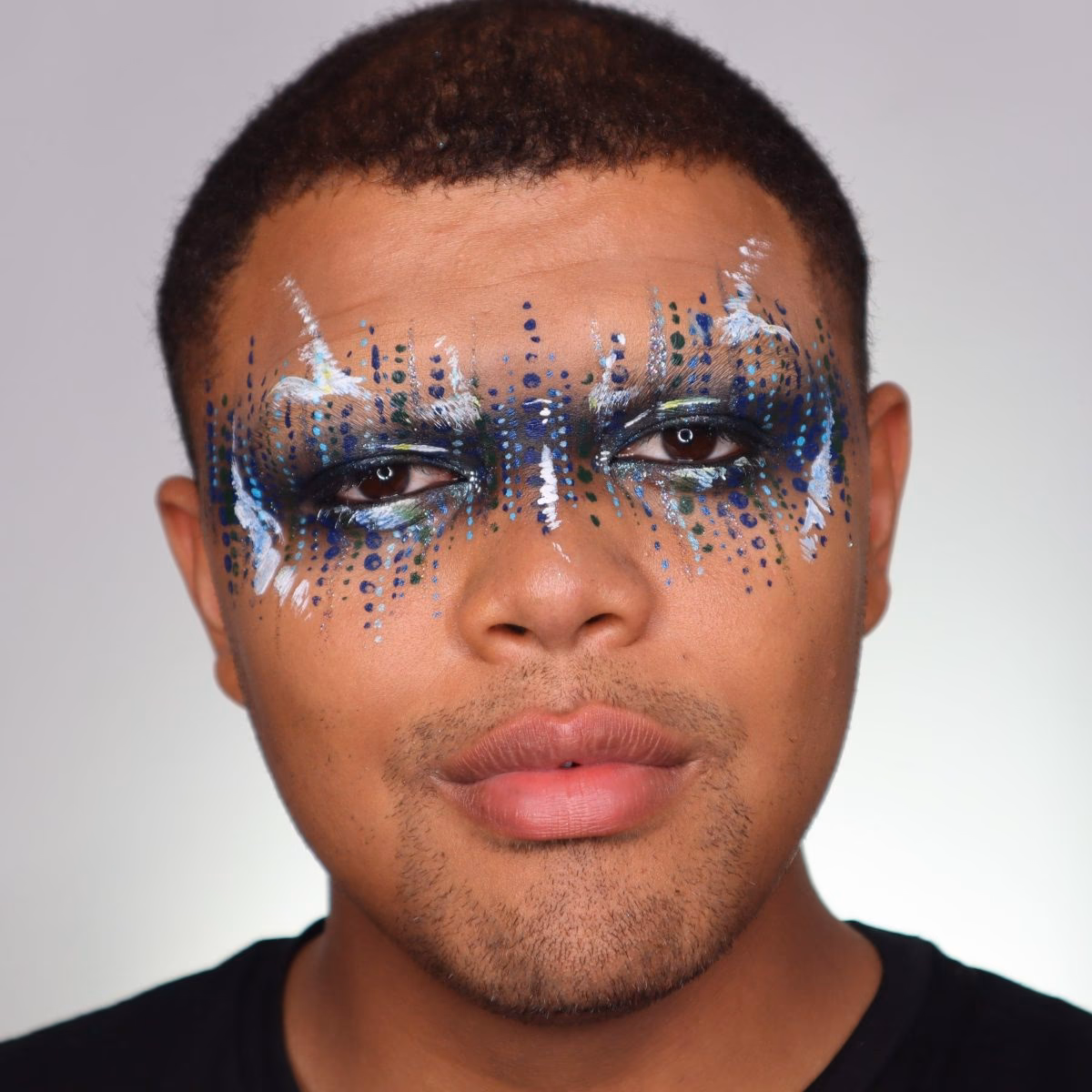 How do you put glitter on a mask?