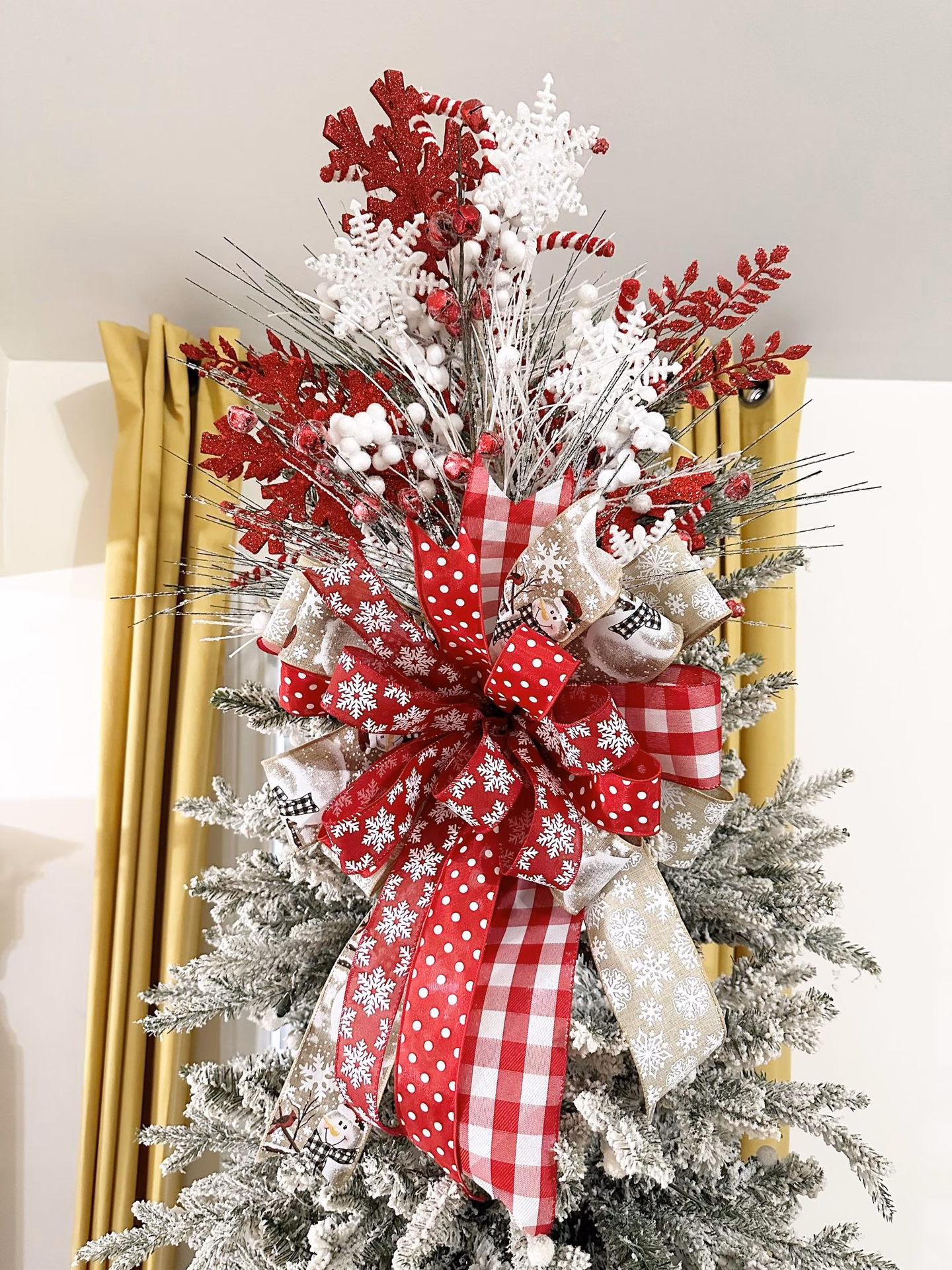 How do you support a tree topper?