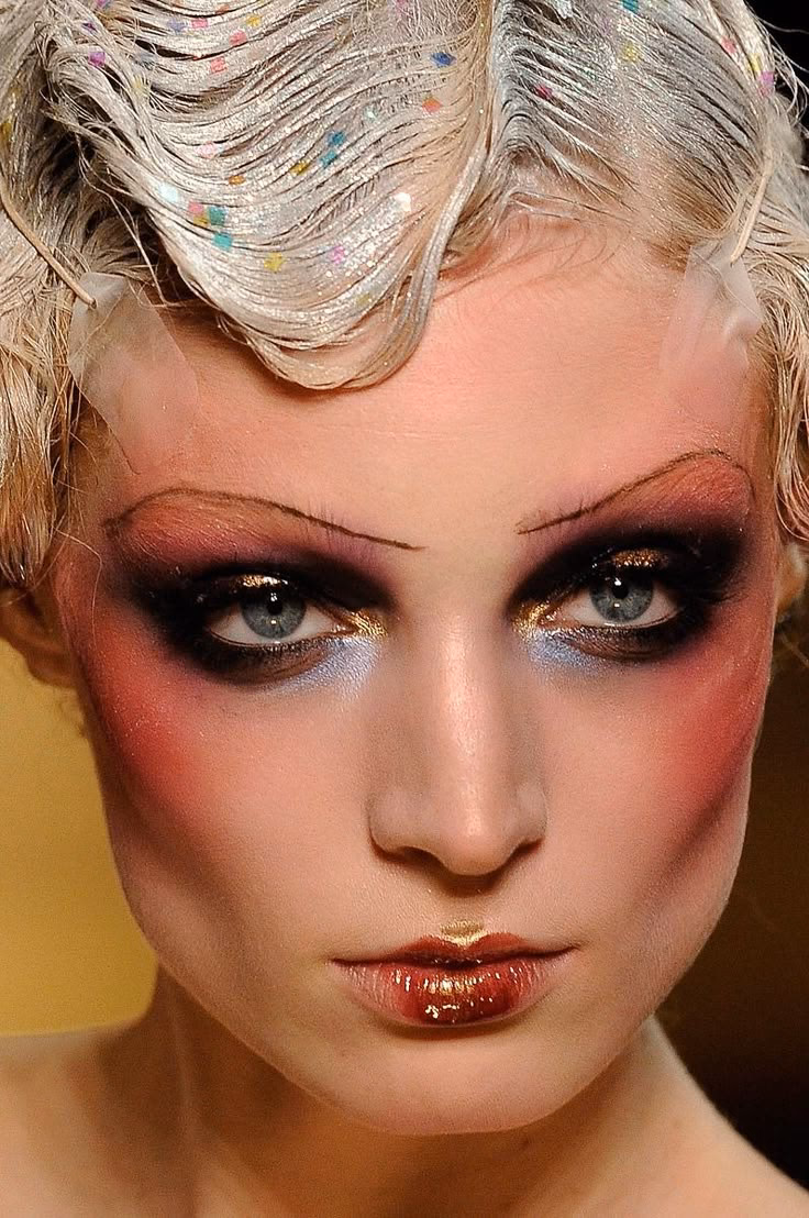 Does John Galliano have his own brand?