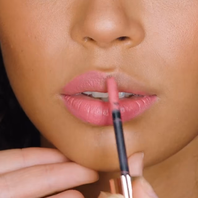 How can I make my lips look pink?