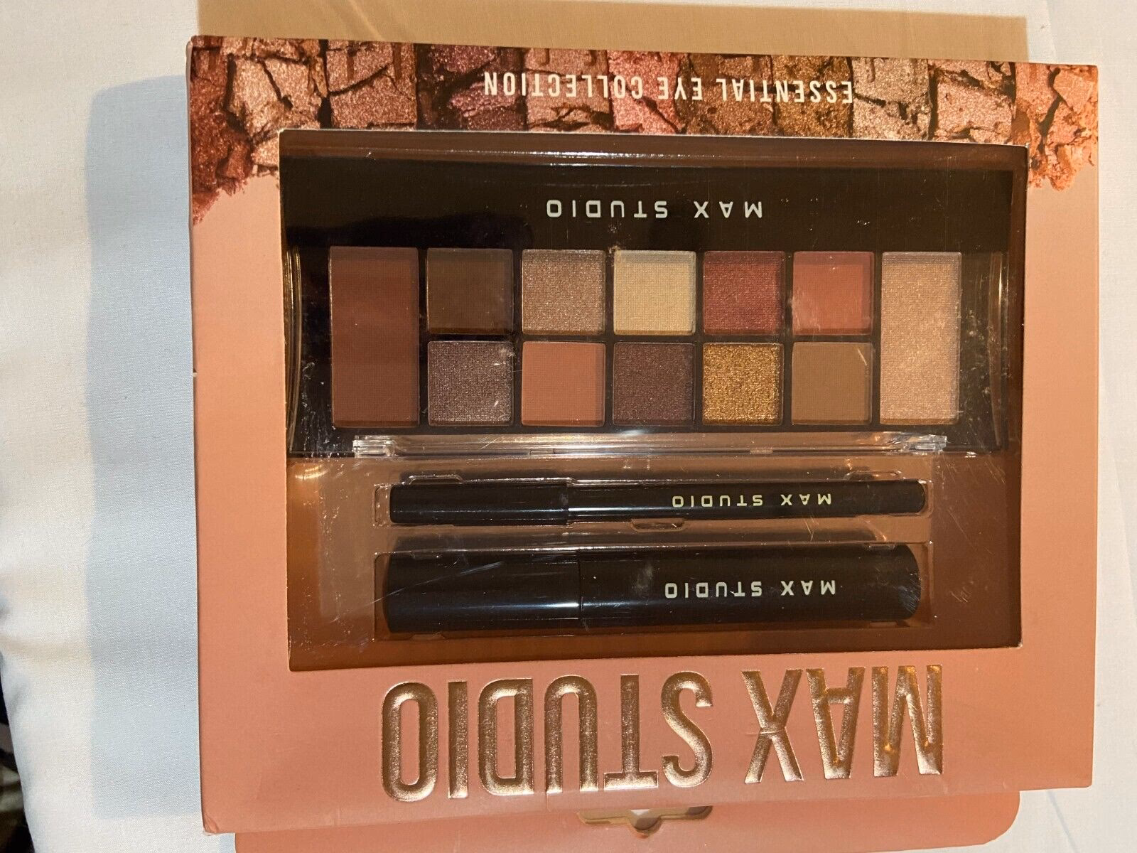 Who owns the brand Max Studio?