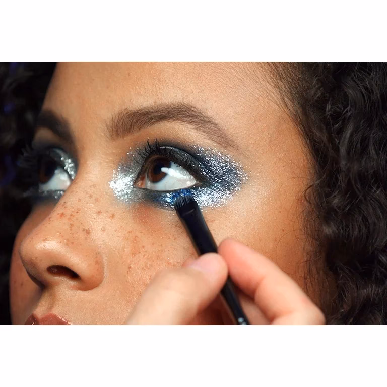 How to get glitter to stay on face?