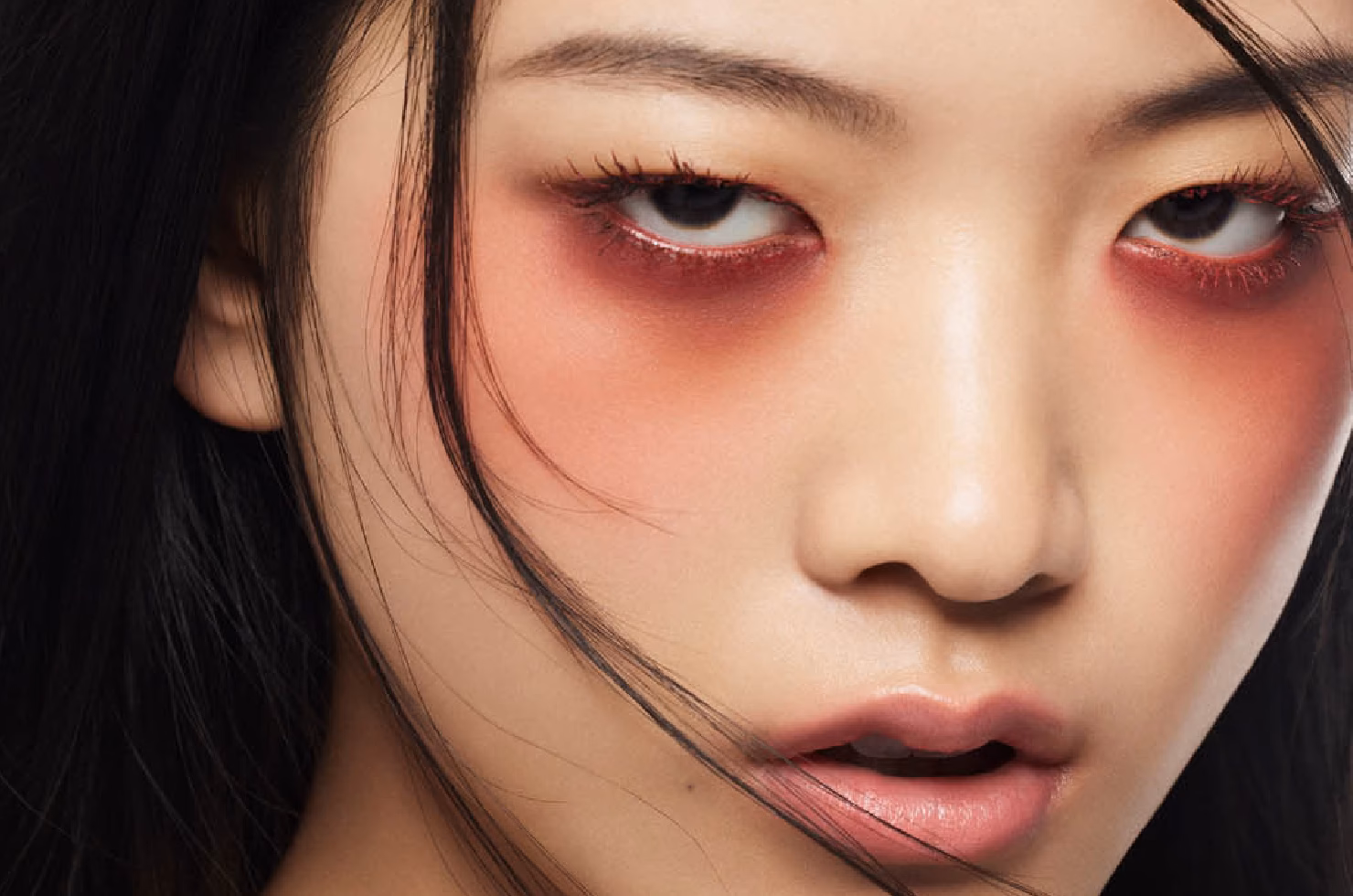 Why put red under eyes?