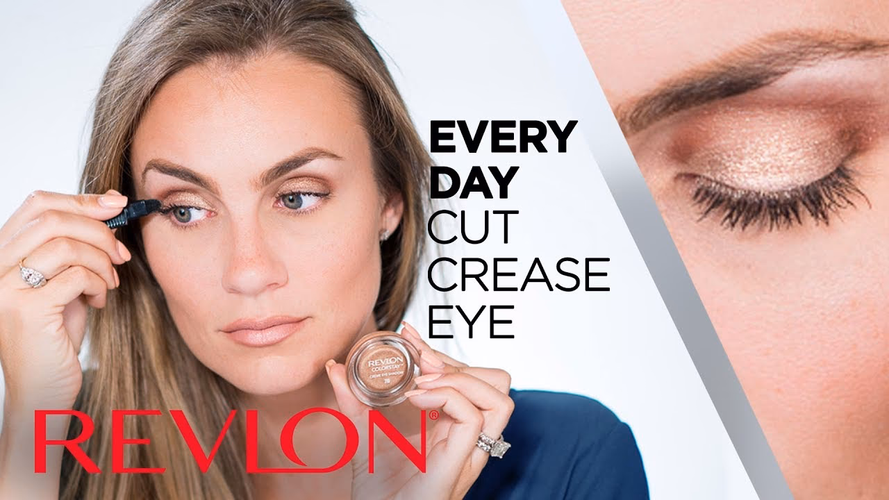 How do you highlight your eyes with makeup?